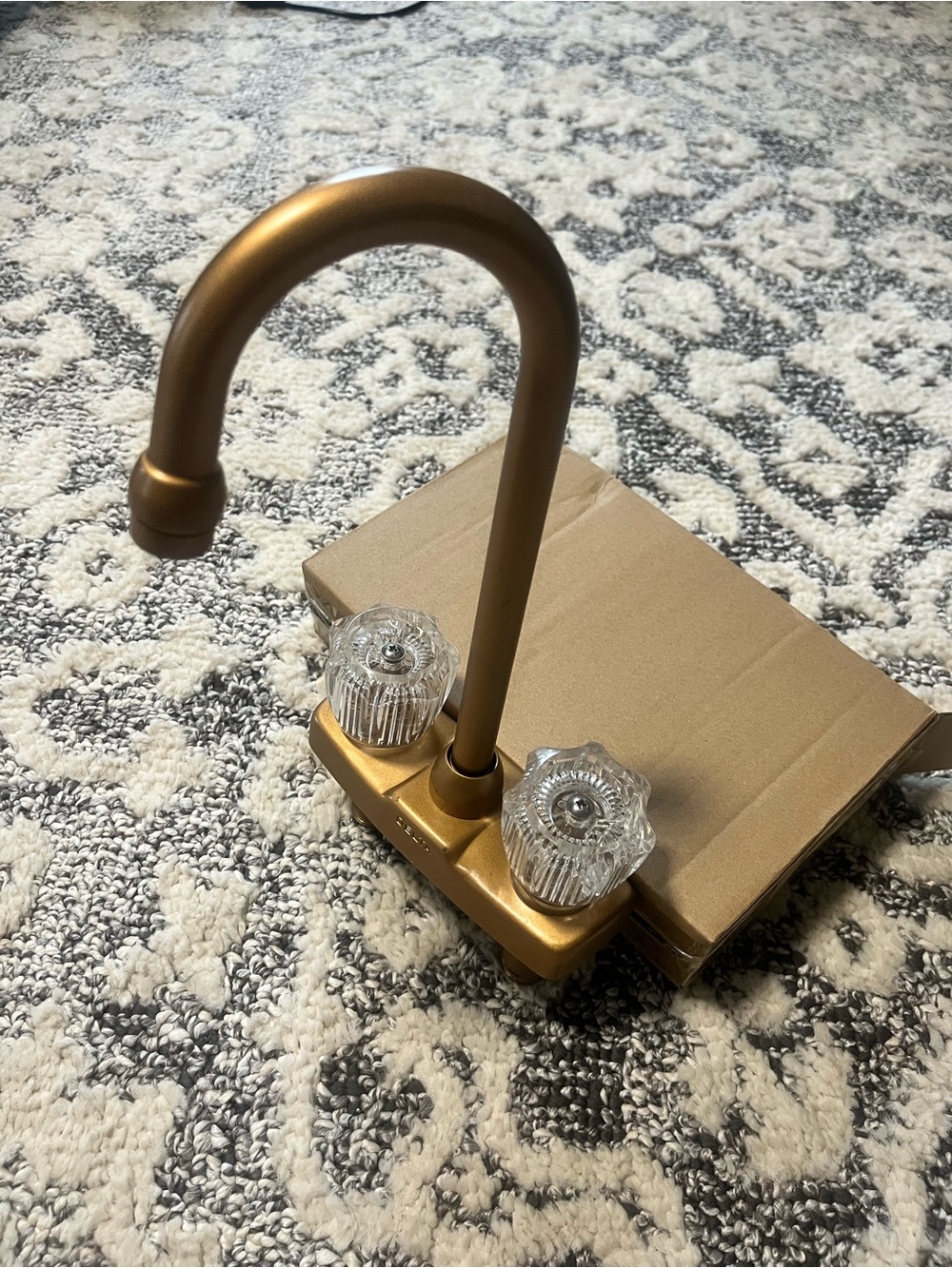 Gold Delta bathroom / kitchen faucet